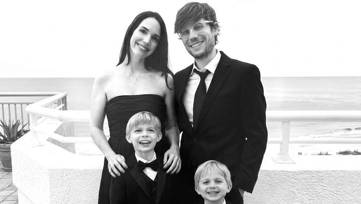 Steven with Amanda and their two sons by the ocean